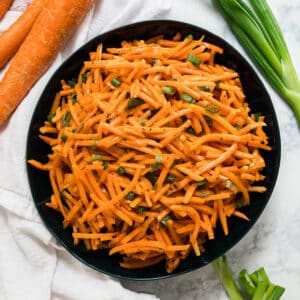 This French Carrot Salad is a light and simple salad! It's so quick and easy to whip up and is sure to become your go-to salad for a busy weeknight!
