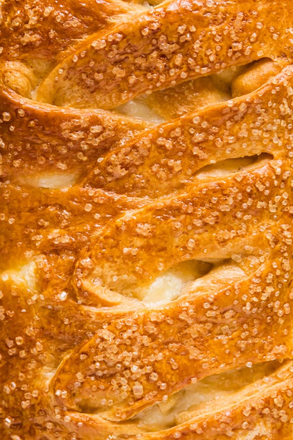 A close up image of the braid on this cheese danish recipe.