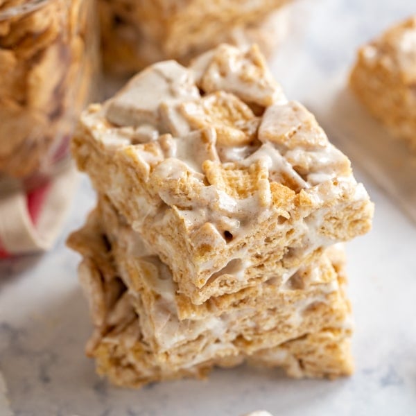 Cinnamon Toast Crunch Bars: an easy, homemade, no-bake dessert. If two of your favorite desserts, Rice Krispy Treats and Snickerdoodle Cookies had a baby, these would be it. Made with marshmallows, cinnamon sugar cereal, and butter, they're an ooey-gooey, crispy snack that's great to bring to a party! 