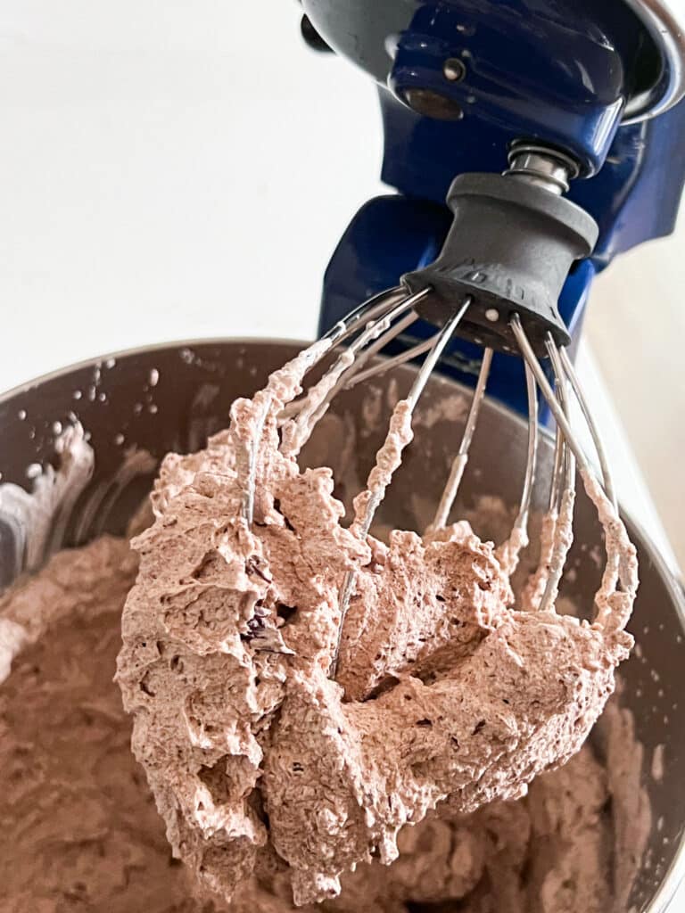 The mousse mixture once it's been combined and whipped to fluffy peaks on the whisk attachment on a stand mixer.