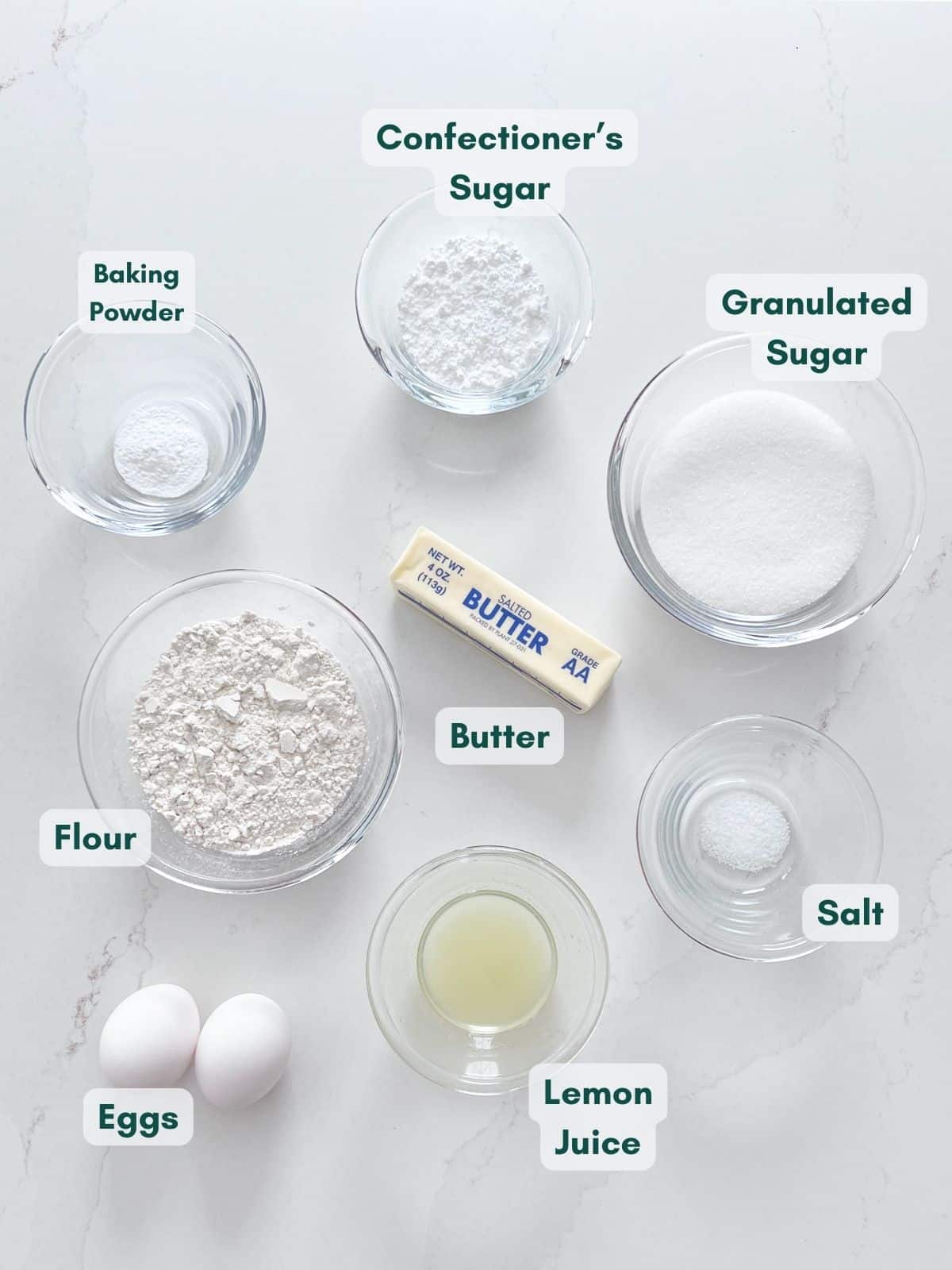 An overhead image of the ingredients labeled in clear bowls.