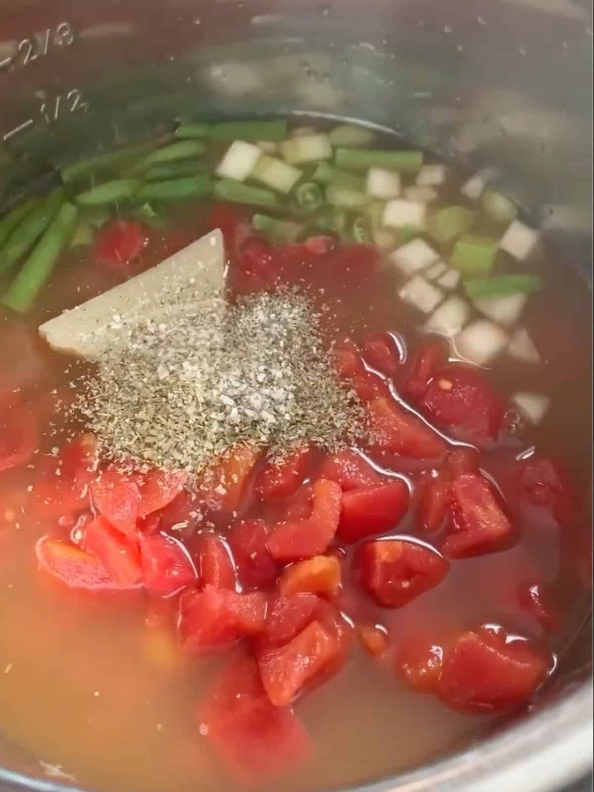 The broth, veggies and soup seasonings in the instant pot.