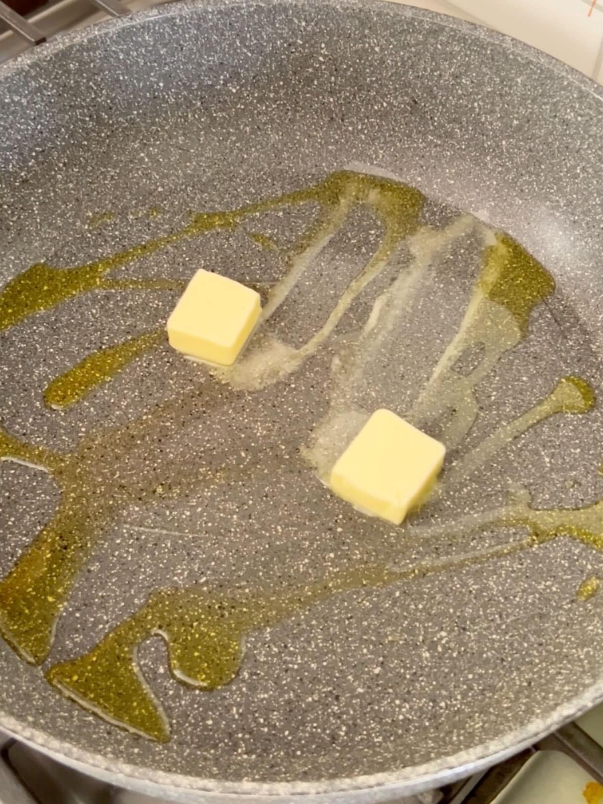 Butter and oil melting in a hot skillet.
