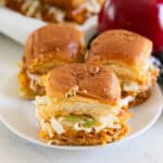 3 BBQ Chicken sliders on a white plate.
