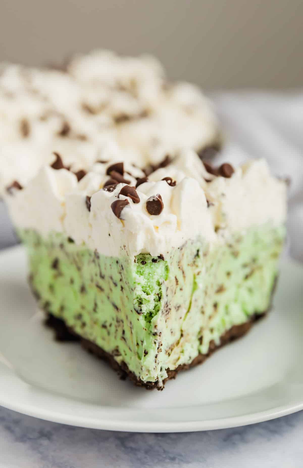 A close up image of of the point of an ice cream pie.