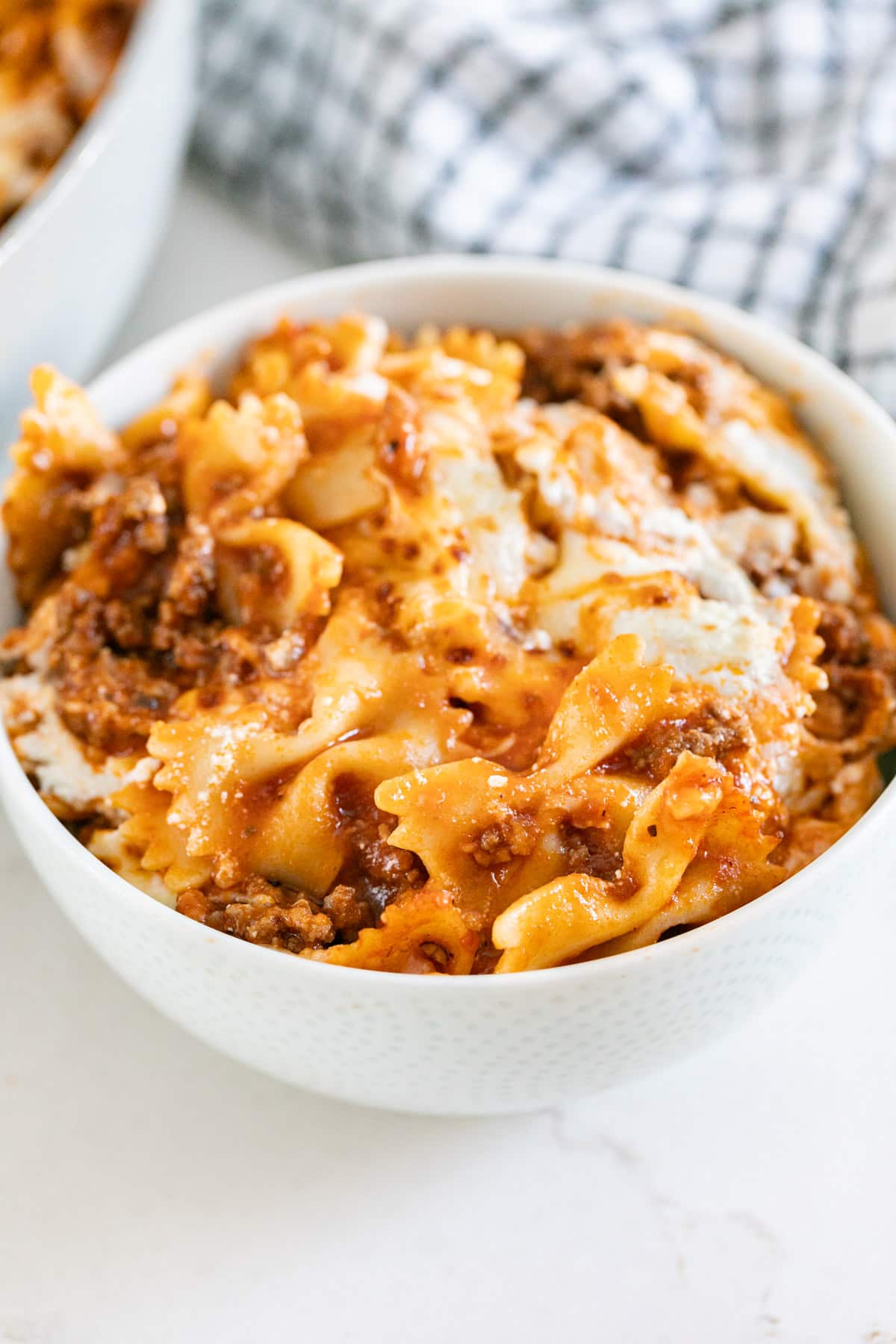 A close up image of a bowl of no bake lasagna skillet.
