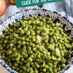 A bowl of peas with onions and a napkin in the background.