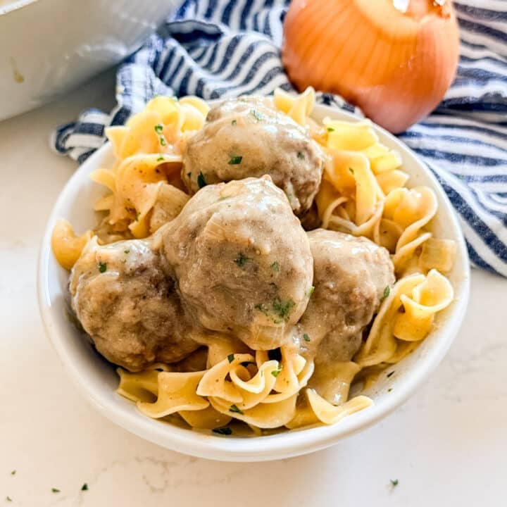 A bowl of Swedish meatballs and noodles.