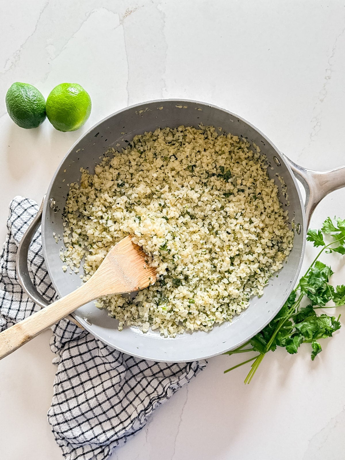 An overhead image of cauliflower rice in a pan.