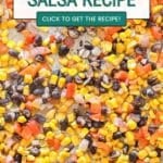 A close up overhead image of corn salsa spread out on the sheet pan.