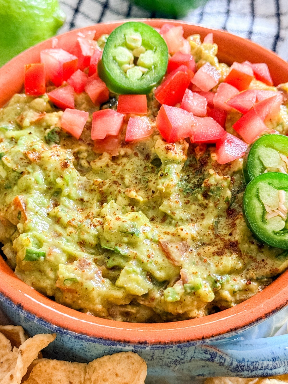 A close up image of guacamole in a bowl.
