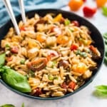 A bowl of caprese pasta salad.