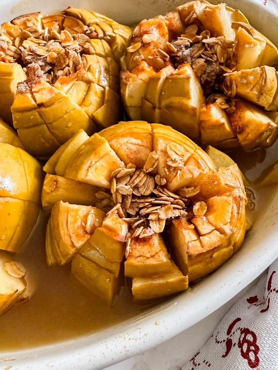 A close up image of a of an old-fashioned baked apple.