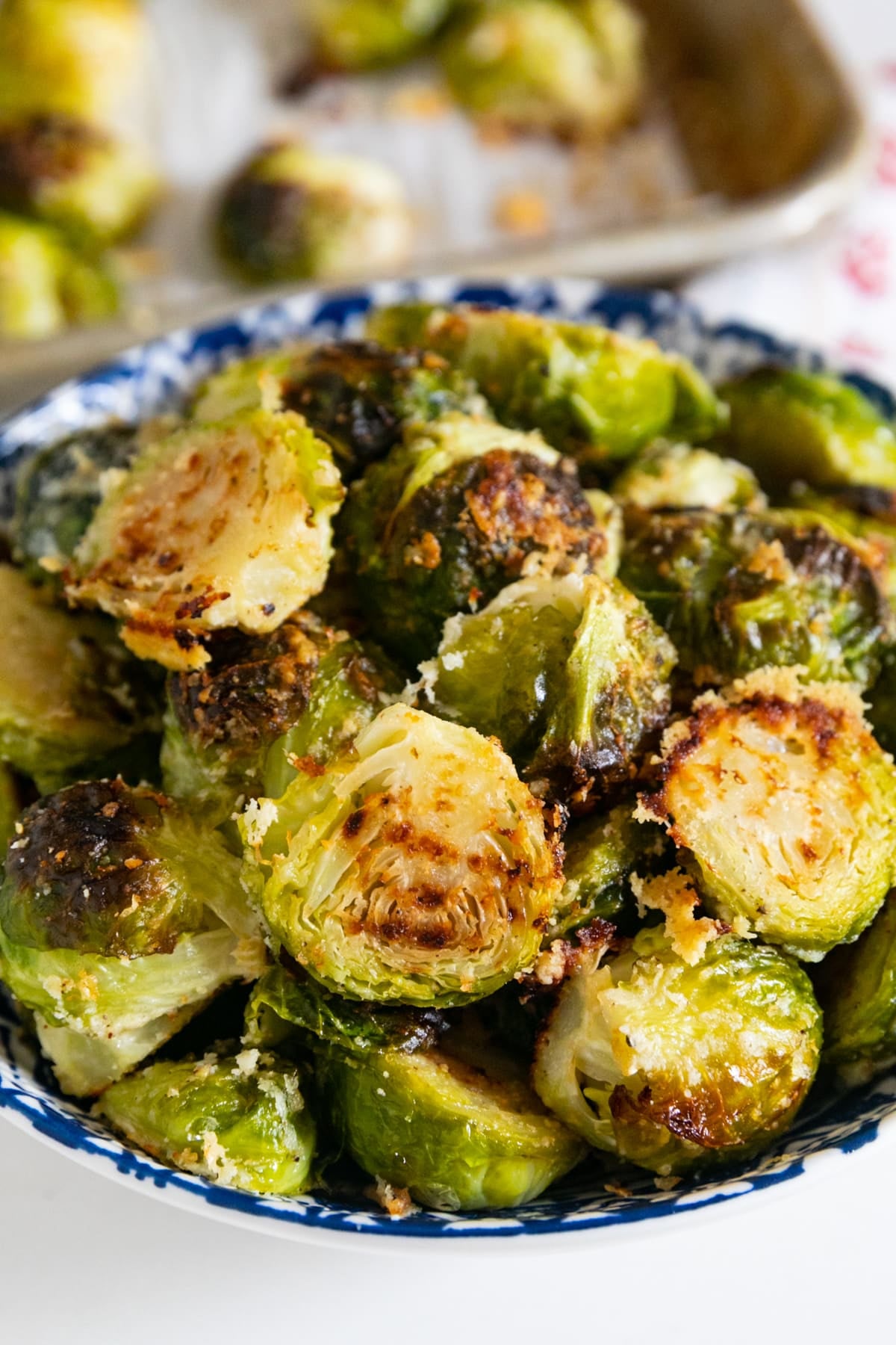 A close up of a bowl of Parmesan Brussels Sprouts.