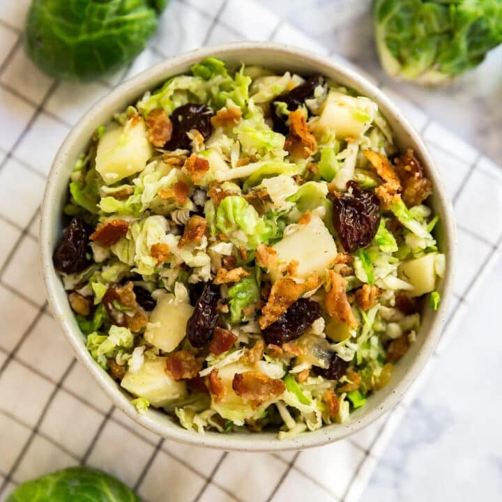 An overhead image of a shaved Brussels sprouts salad recipe.